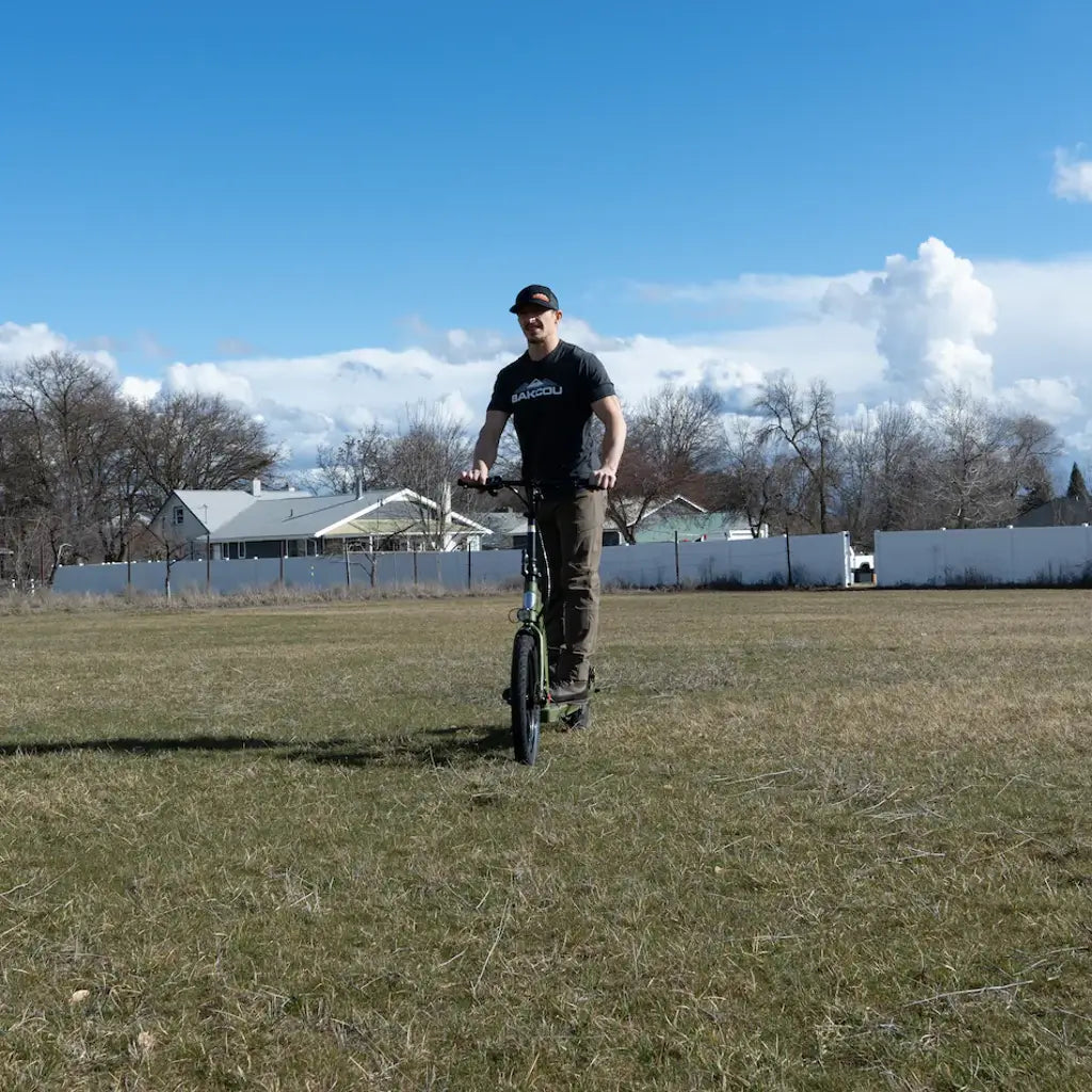 Bakcou Mini Badger 350W 36V Electric Scooter  grass